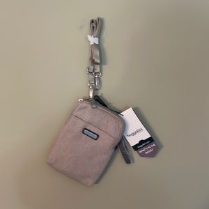 Baggalini with wristlet and shoulder strap